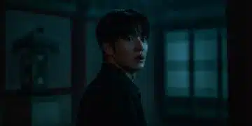 Terrified woman in a dark, atmospheric horror K-Drama scene, highlighting suspense.